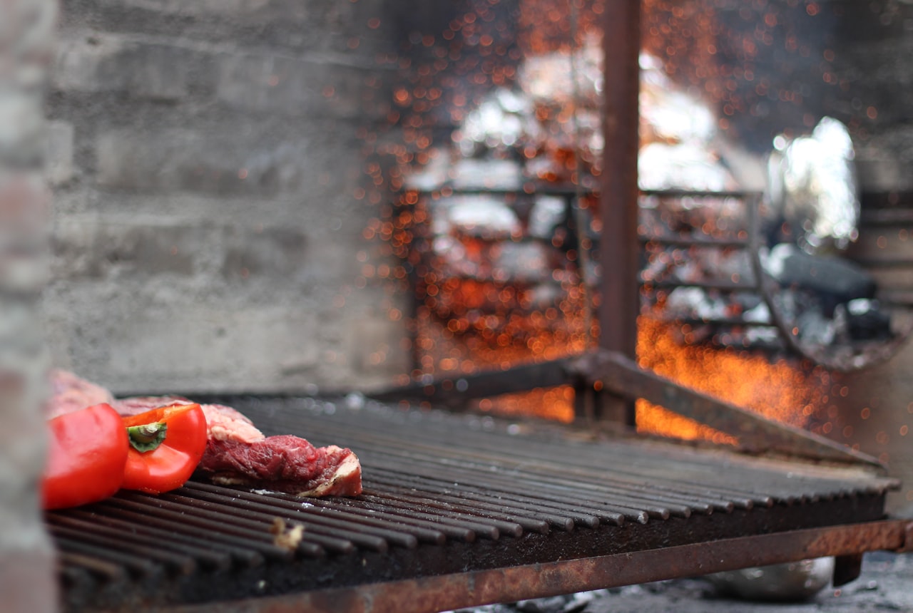 Argentine asado — grilled meats with a glass of red wine