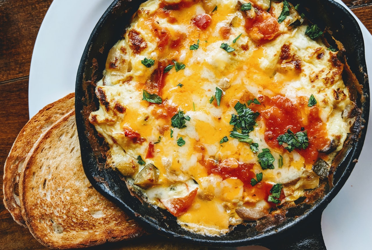 Melted golden cheese on a small skillet, asado-style provoleta