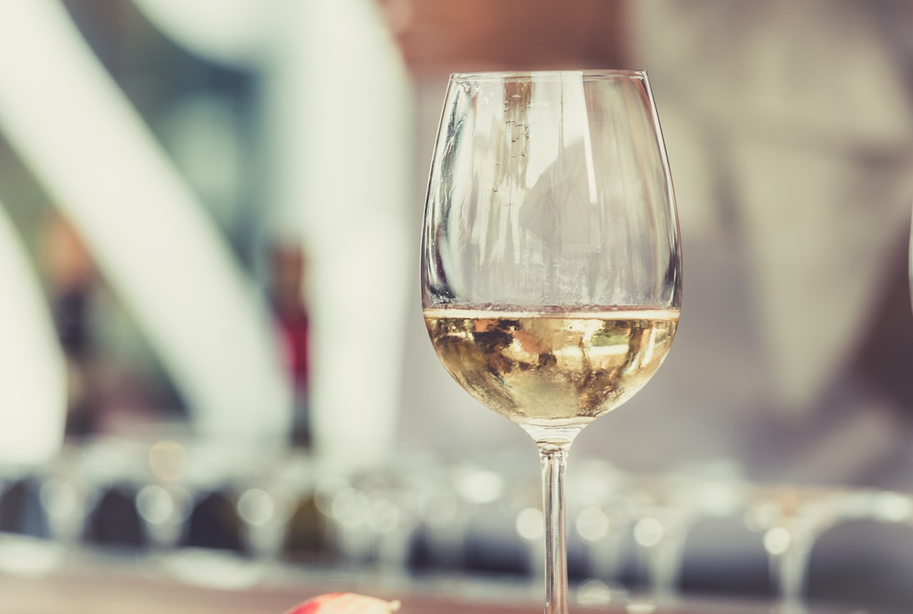 A glass of golden, creamy-looking Chardonnay