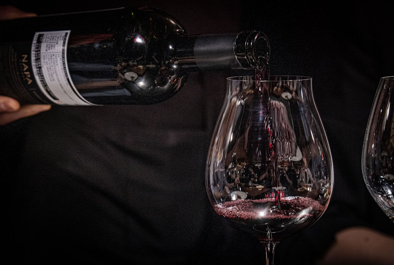 Red wine being poured into a glass