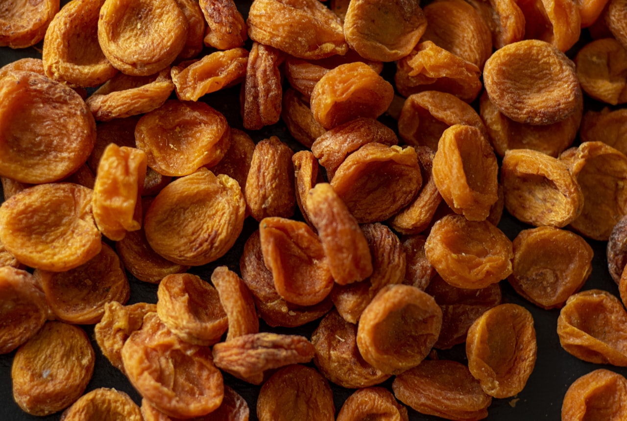 An assortment of dried fruit including apricots