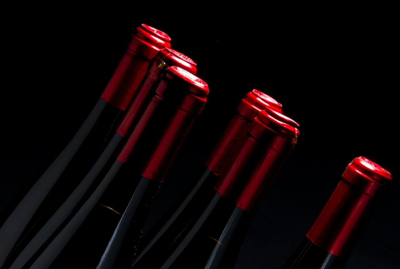 A beautiful bottle of Argentine Torrontés with screw cap alongside a premium Argentine Malbec with cork