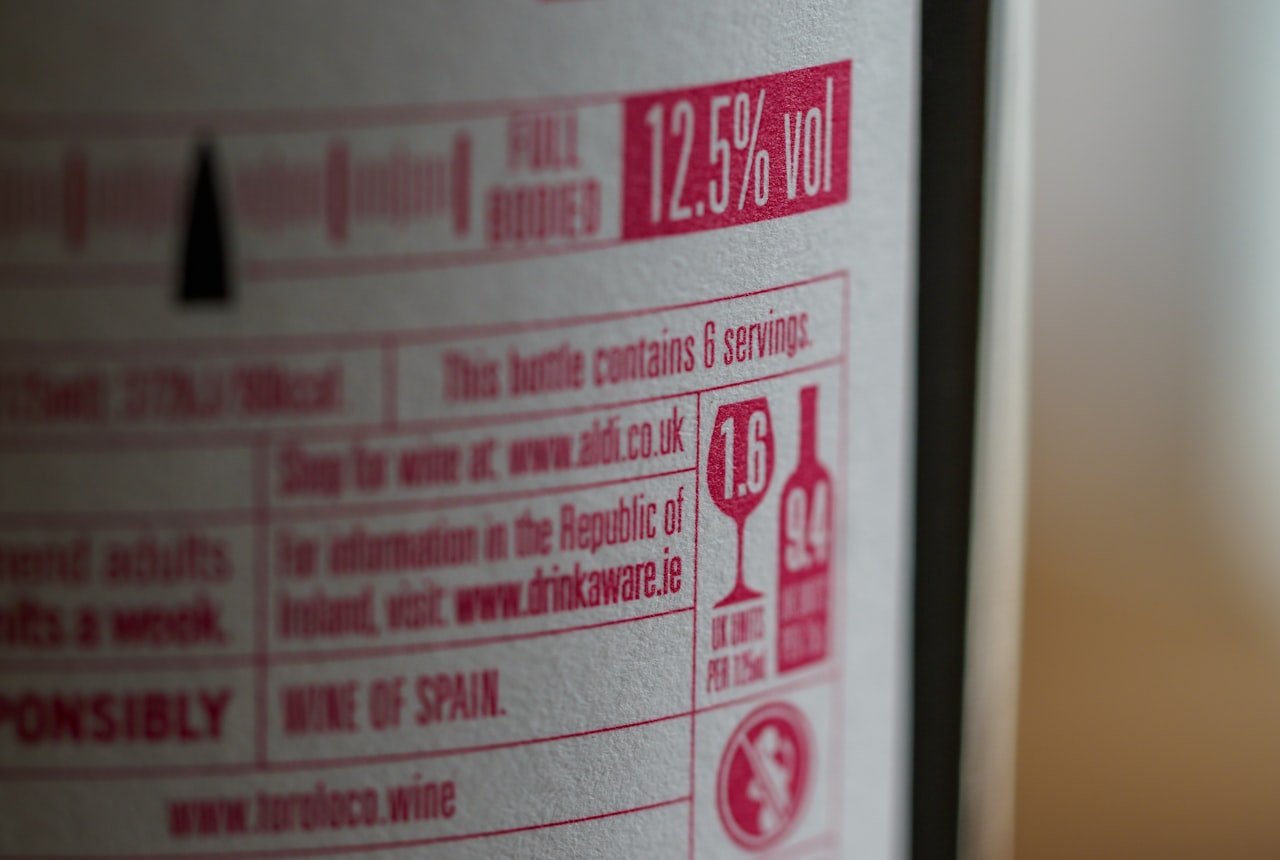 Close-up of a back label showing ABV percentage in clear focus, rest of label softly blurred